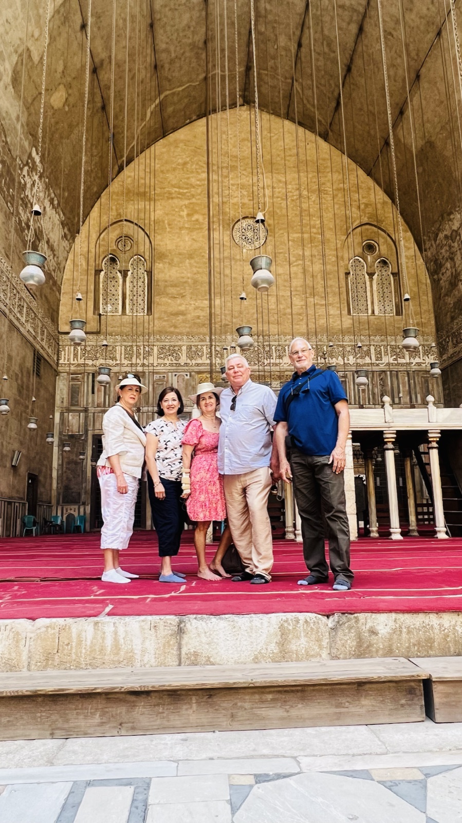 Wayfinder guests inside the monumental Sultan Hasan Mosque